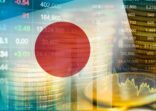 Japan flag with stock market finance, economy trend graph digital technology.