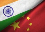 China and India two flags together textile cloth fabric texture