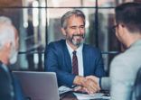 Businessmen handshake in the office