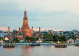 Wat Arun and cruise ship in night ,Bangkok city ,Thailand