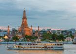 Wat Arun and cruise ship in night ,Bangkok city ,Thailand