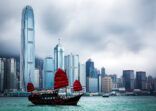 Traditional Chinese Junkboat Sailing Across Victoria Harbour, Hong Kong