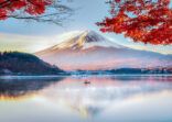 Fuji Mountain , Red Maple Tree and Fisherman Boat with Morning Mist in Autumn, Kawaguchiko Lake, Japan