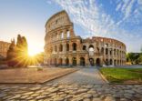 Colosseum in Rome and morning sun, Italy